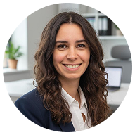 Portrait of Luciana, founder of The Coliving Academy, smiling in an office